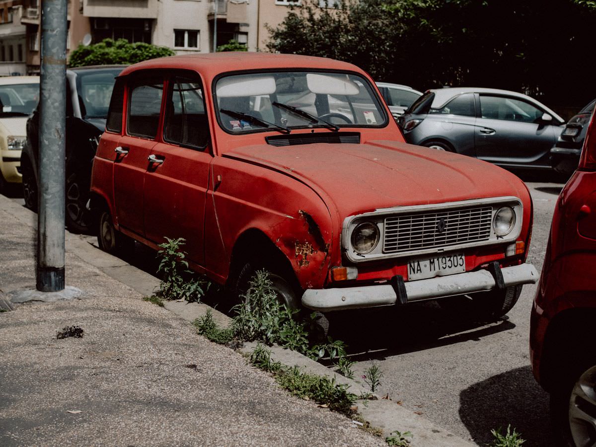 old red car on the italian street