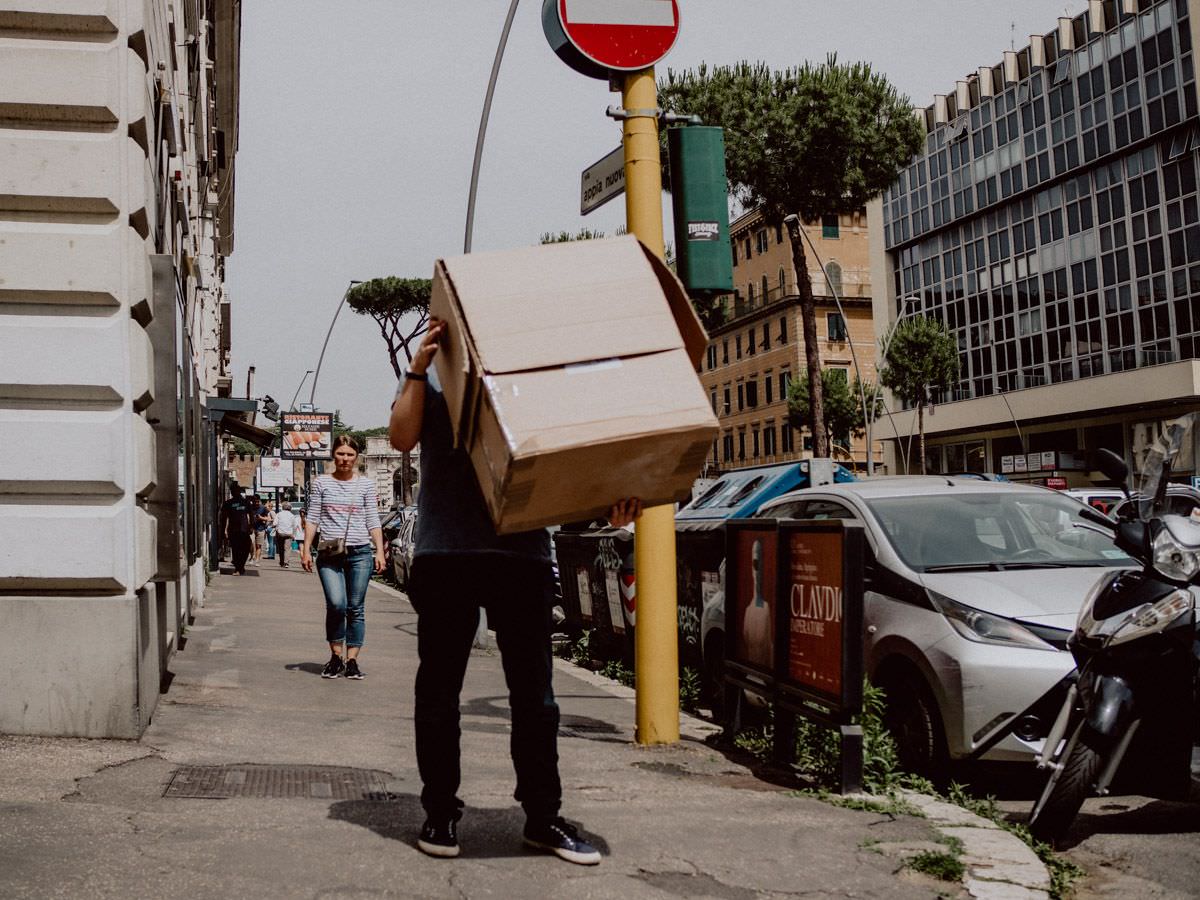 man with the box on the street