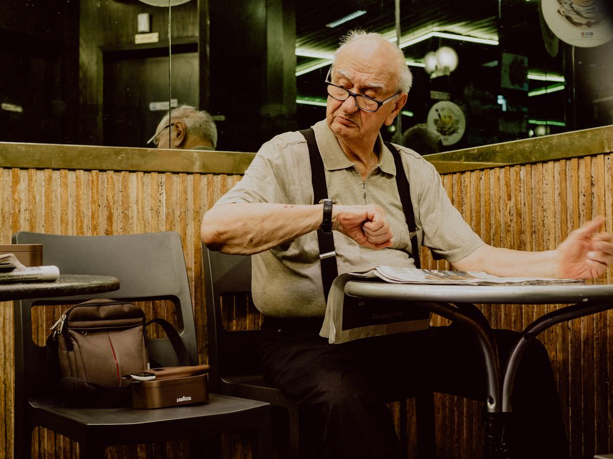 old man check the hour