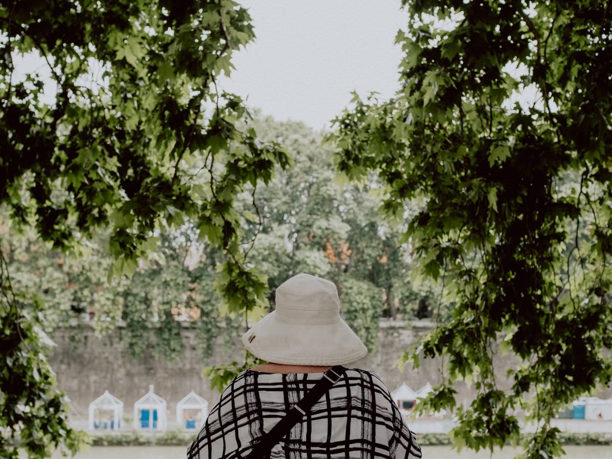 woman in the white hat