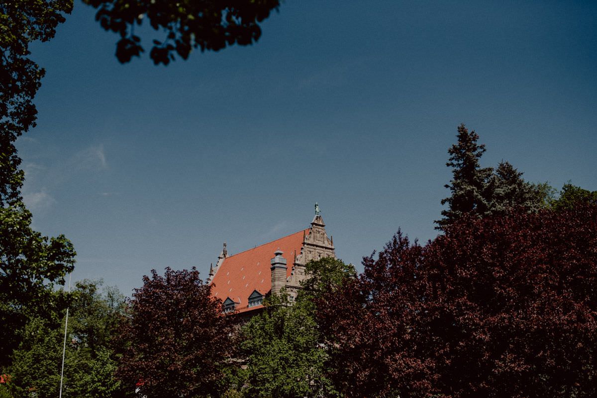 church between trees in torun