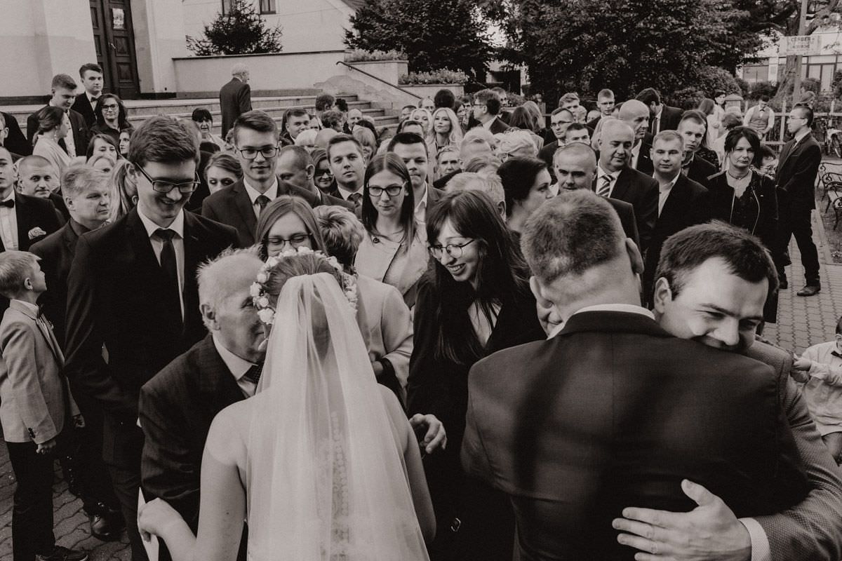 wishes for the bride and groom in front of the church