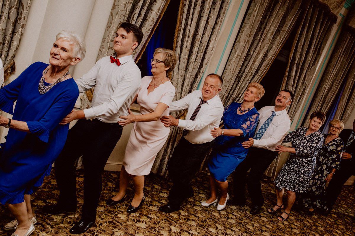 wedding guests dance one after another
